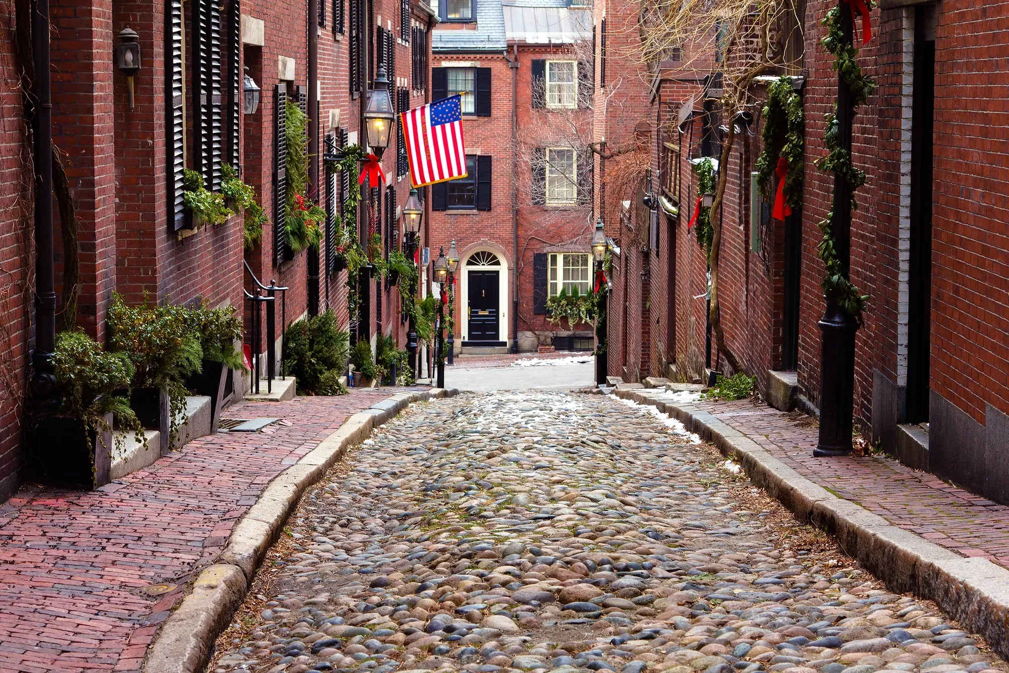 Brick townhouses on a cobbled Beacon Hill street in Boston