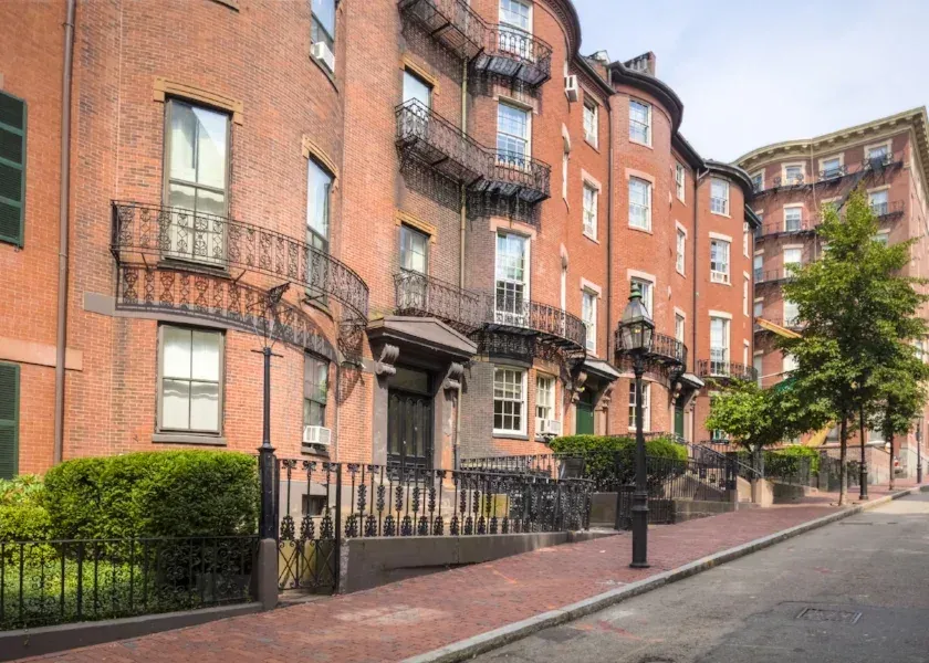 Period balconies and ironwork on a restored Boston brownstone